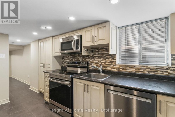 Living room - Basement - 1042 St Clarens Avenue, Toronto, ON M6H3X7 Photo 2