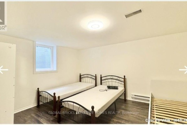A kitchen with white cabinets, stainless steel appliances, and grey countertops. - Basement - 1761 Mcgill Court, Oshawa