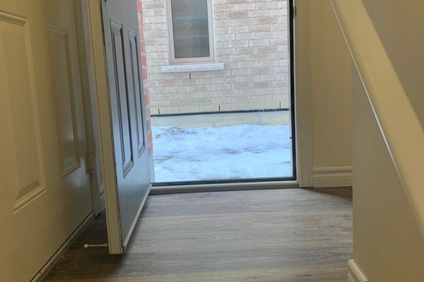 Entryway with a view of the outside, featuring a snow-covered area. - Basement - 18 Elderslie Crescent, Vaughan