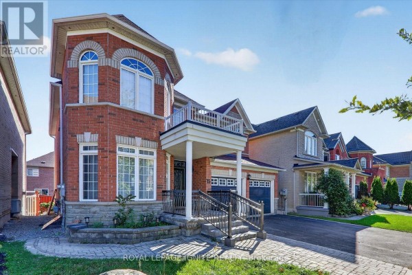 Side exterior view of a brick house showing the entrance with stairs and railing. - Bsmt - 15 Starry Crescent, Toronto