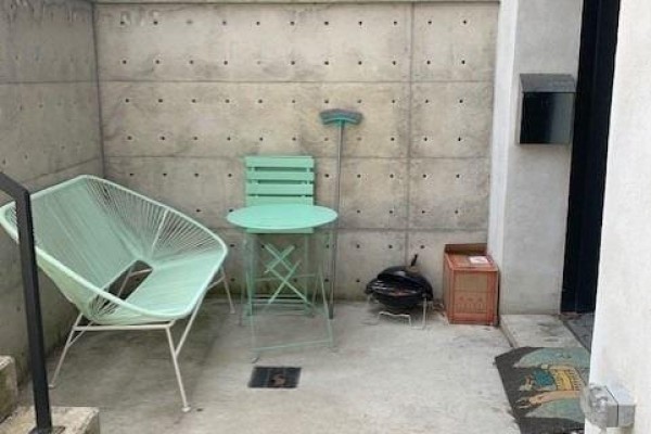 Small patio area with mint green chairs, small grill, and mailbox. - Bsmt - 152 Close Avenue, Toronto