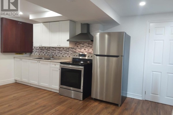 Modern kitchen with stainless steel appliances and white cabinetry - Bsmt - 40 Gray Crescent, Richmond Hill