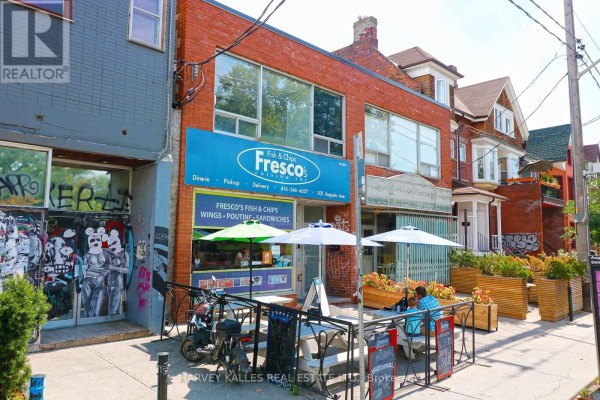Street view showing Fresco's restaurant and adjacent buildings with graffiti. - C - 201 Augusta Avenue, Toronto