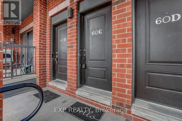 Interior hallway with white walls, front door, and welcome mat - C - 60 Jaguar Private, Ottawa
