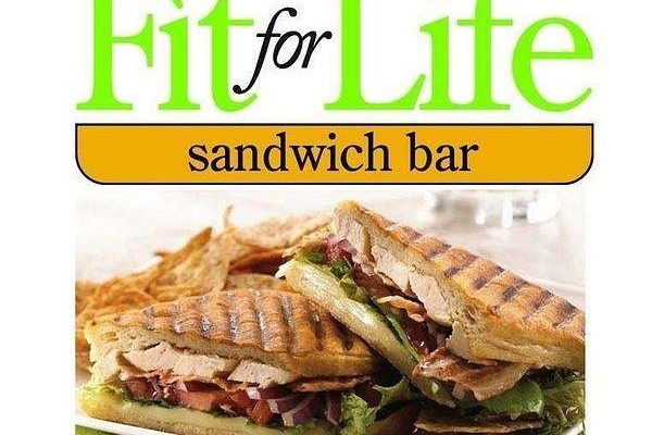 Close-up of a grilled chicken sandwich on a plate with chips. - Fc 7 - 280 Guelph Street, Halton Hills