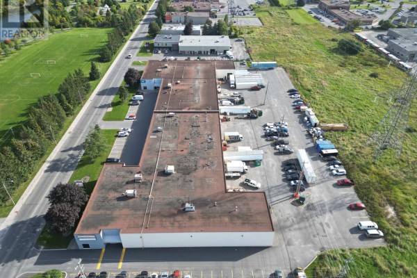Aerial view of the commercial property and surrounding suburban industrial area. - G-h - 60 Colonnade Road, Ottawa