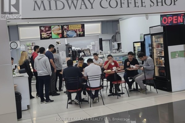Midway Coffee Shop interior with customers dining and ordering. - G11 - 2340 Dundas Street W, Toronto