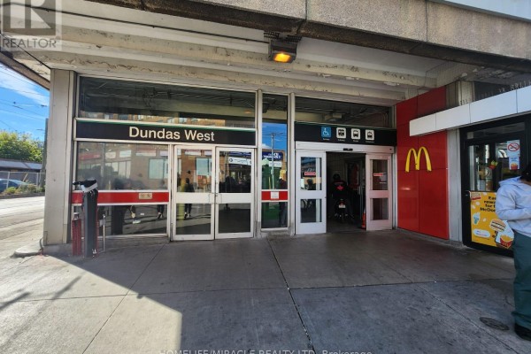 Entrance to Dundas West subway station with McDonald's adjacent. - G11 - 2340 Dundas Street W, Toronto