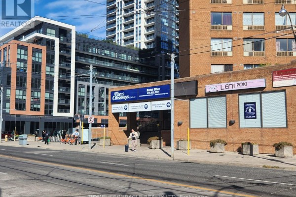 Street view of The Ossington complex and Leni Port with residential buildings. - G11 - 2340 Dundas Street W, Toronto