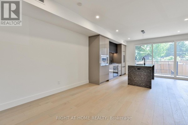 Primary Bedroom - Ground Floor - 2343 Gerrard Street E, Toronto, ON M4E2E6 Photo 4
