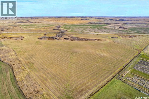 Aerial view of a cultivated farm field with red boundary lines, adjacent to a highway. - Highway #41 Farm Land, Corman Park Rm No  344