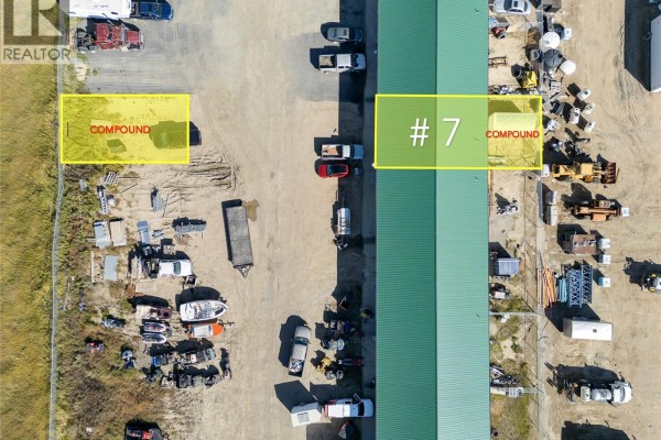 Overhead view of commercial building exterior, with outdoor storage and marked compounds highlighted. - Hwy 11 Bays, Lumsden Rm No  189