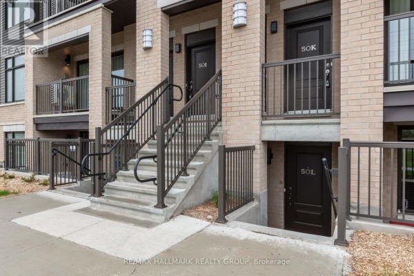 Close-up of stairs leading to apartment entrances 50K and 50L at K - 50 Jaguar Private. - K - 50 Jaguar Private, Ottawa
