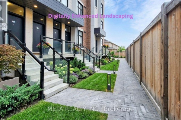 Townhouse complex exterior with brick facade, landscaped gardens, and paved walkways. - L144 - 9560 Islington Avenue, Vaughan