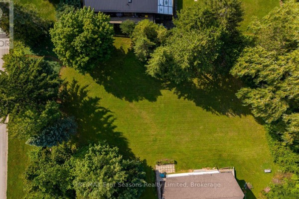 Top-down view of a flat, grassy lot surrounded by mature trees. - Lot 11 Craigleith Road, Blue Mountains