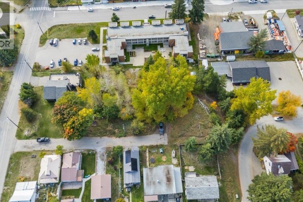 Overhead view of the property lot with surrounding houses and trees. - Lot 13-20 Third Avenue, Rossland