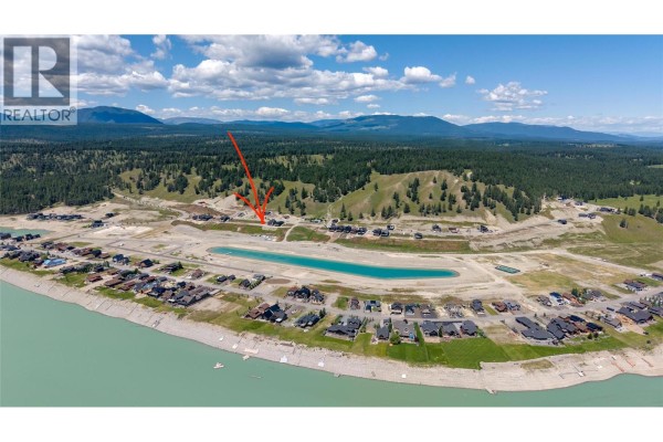 Aerial view showing Lot 14 Marcer Road property location near the lake and development. - Lot 14 Marcer Road, Lake Koocanusa