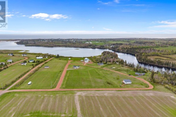 Aerial view of residential lots bordering a river and lake with distant ocean. - Lot 18 Majestic View Lane, Lakeside