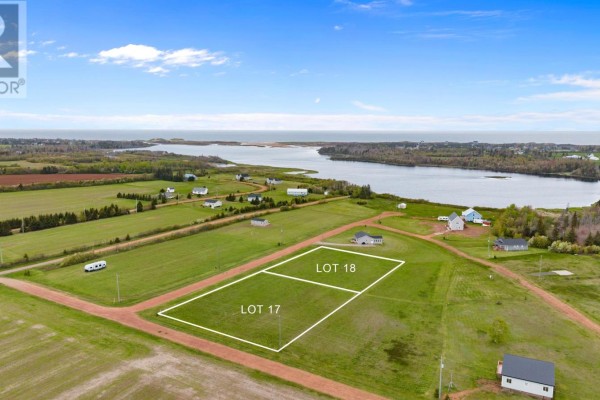 Aerial view showing Lots 17 and 18 marked on residential land with a lake and ocean view. - Lot 18 Majestic View Lane, Lakeside