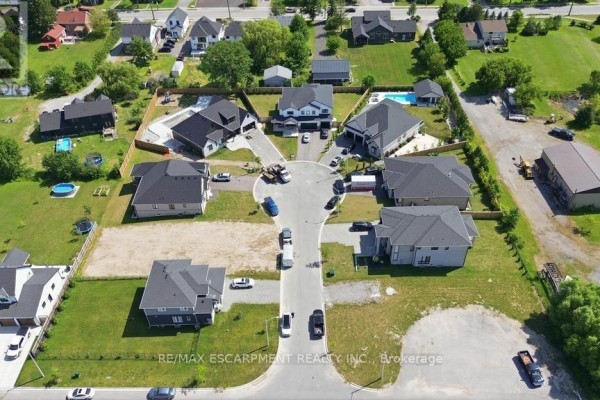 Aerial view highlighting the marked lot within a developing neighborhood - Lot 18 Vosburgh Place, Lincoln