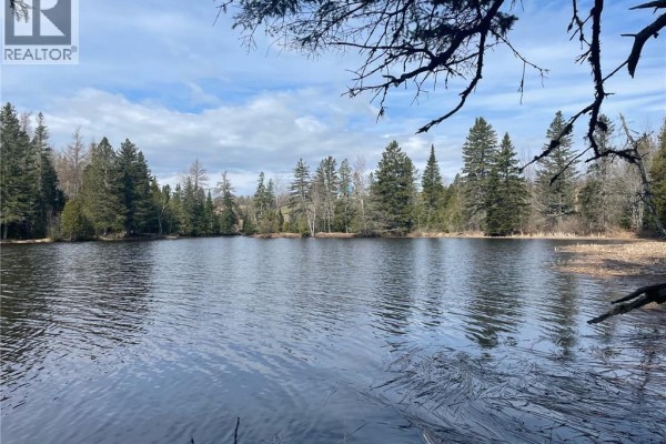 Calm lake water surrounded by trees under a cloudy sky. - Lot 23-1 And Lot 23-2 Alden Warmen Road, Bass River