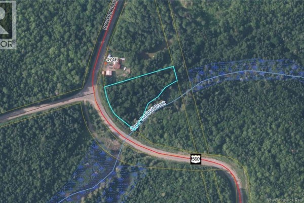 Aerial map shows a wooded lot next to Route 560 and Upper Guigougs Brook. - Lot 24-01 Route 560, Listerville