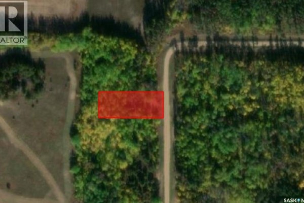 Aerial satellite view showing a rectangular property outlined in red within a heavily wooded area next to a dirt road. - Lot 3 - Station Lane, In Rm Of Nipawin, Nipawin Rm No  487