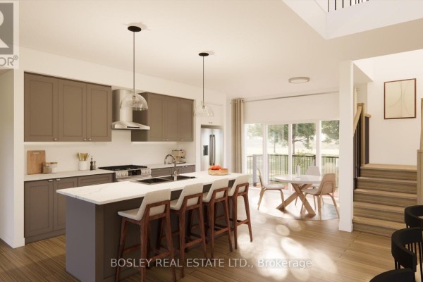 Kitchen with gray cabinets, large island, and stainless steel appliances - Lot 30 Street A, Port Hope