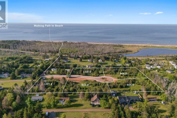 Aerial view of several lots divided by white lines with a road through the center. - Lot 5 Surf Lane, Stanhope
