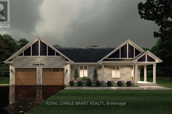 Front facade of a two-car garage home with stone accents and gabled rooflines on a slightly overcast day. - Lot 7 Willowdale Street, Brantford