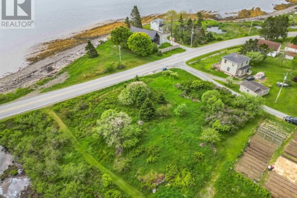 Aerial view of the shoreline with homes and a nearby marina. - Lot B-1 B2 B-3 Parcel 25-1 Highway 331, Dublin Shore