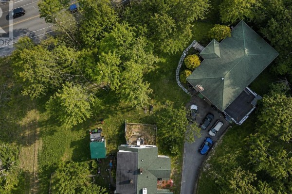 Overhead view of a property with two houses surrounded by mature trees. - Lot B-2-b Bedford Highway, Halifax