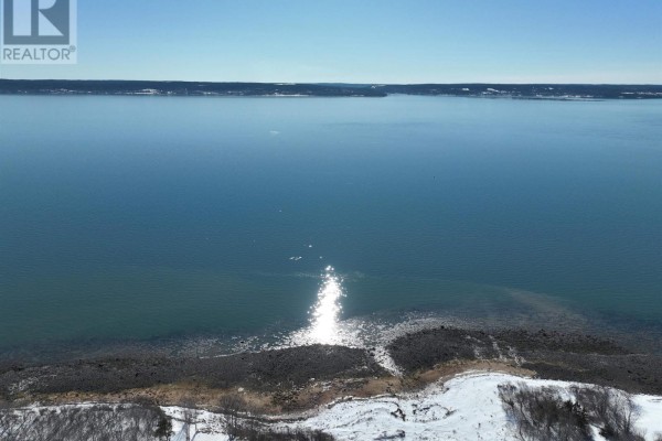 Aerial perspective of the area showing homes, fields, and the waterfront. - Lot Granville Road, Port Wade