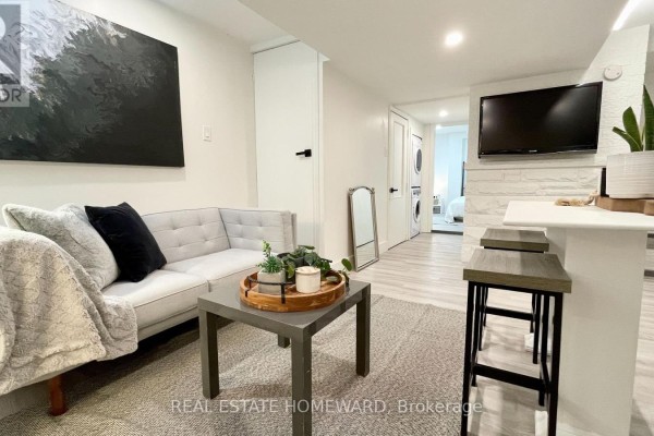 Living room - Lower - 145 Boston Avenue, Toronto, ON M4M2T8 Photo 2