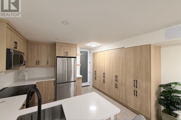 Kitchen - Lower - 173 Beatrice Street, Toronto, ON M6G3E9 Photo 2