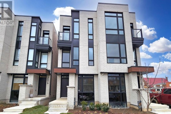 Exterior view of modern townhouses, one numbered 206, with contemporary design. - Lower - 208 Mcroberts Avenue W, Toronto