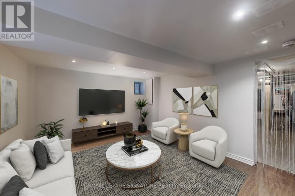 Living room with ample seating, featuring a sectional sofa, two chairs, and a media console. - Lower - 553 Euclid Avenue, Toronto