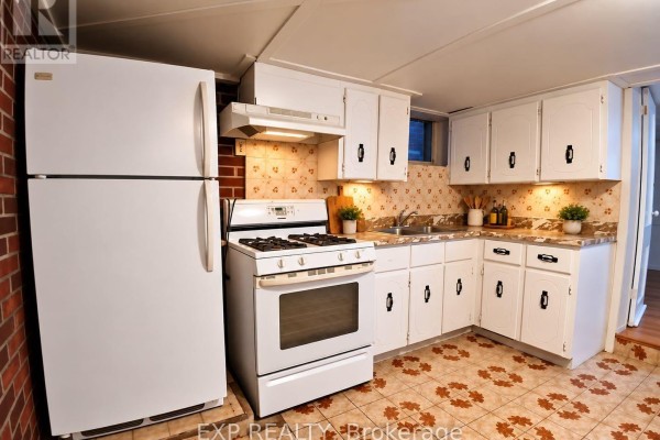 Den - Lower Level - 310 Westwood Avenue, Toronto, ON M4J2H7 Photo 4