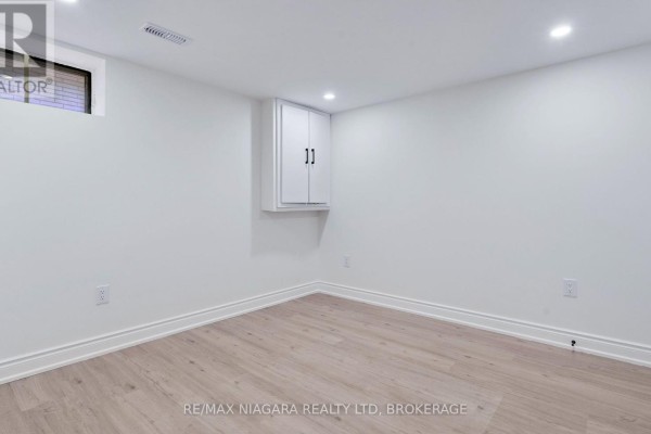 Living room - Lower Unit - 210 Mackan Street, Thorold, ON L2V1G7 Photo 5