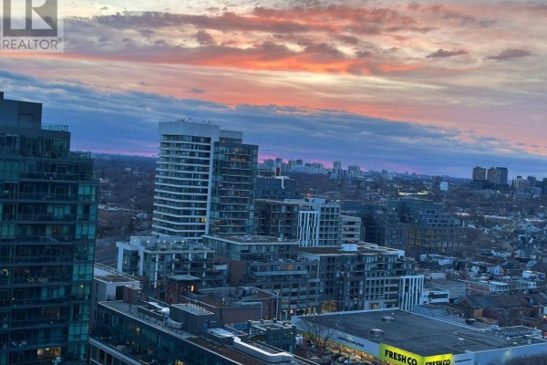 Panoramic view of Toronto skyline at sunset with colorful clouds and modern buildings. - Lp-09 - 68 Abell Street, Toronto