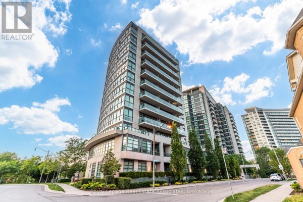 Exterior view of a modern glass condo building with balconies on a cloudy day. - Lph21 - 35 Brian Peck Crescent, Toronto