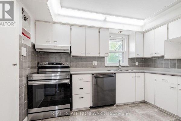 Kitchen with white cabinets, gray tiled backsplash, stainless steel oven, and dishwasher. - Main - 11 Greenbriar Road, Toronto