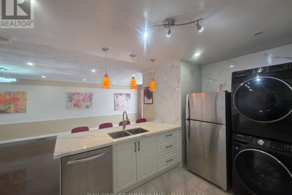 Small bathroom with white tile, bathtub, shower, and two windows with mini blinds. - Main - 211 Beechy Drive, Richmond Hill