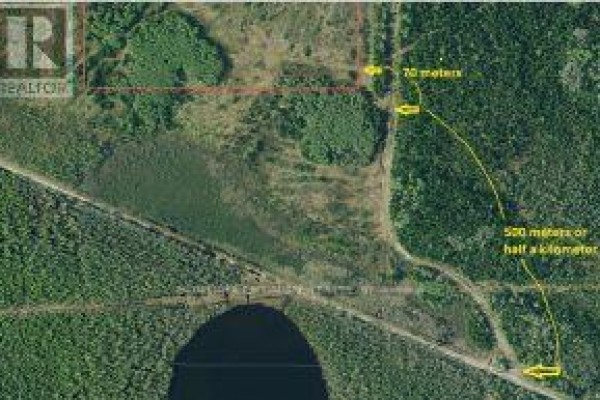 Aerial view showing distance markers from property to a road and a dark body of water. - Ne Part Of S Lot 1 Con 6 N/a, Timmins