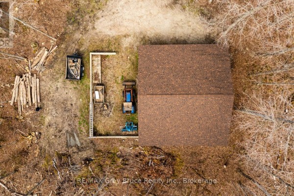 Direct overhead view of the detached garage and surrounding wooded area. - Part 10 Tammy's Cove Road, Northern Bruce Peninsula