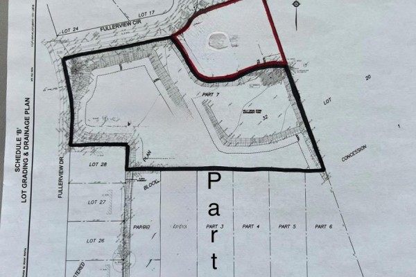 Lot grading and drainage plan shows property boundaries and lot numbers on a paper document. - Part 3 Kitchigami Road, Central Huron