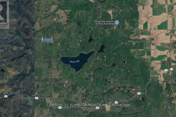 Satellite map showing the property lot northwest of Oliver Lake, surrounded by dense forest and numerous small lakes and wetlands. - Pcl 5406 Con 4 N Pt 11, Neebing
