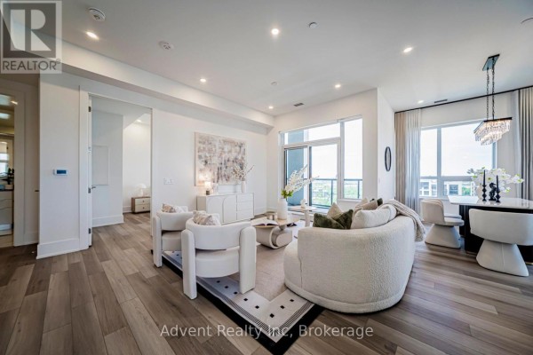 Balcony with floor-to-ceiling windows and a view of the city skyline. - Ph01 - 8 Cedarland Drive, Markham