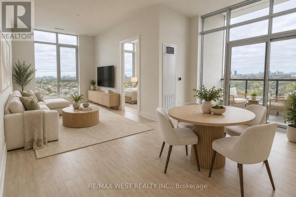 Living and dining area with light wood floors, large windows, balcony, and city views. - Ph04 - 858 Dupont Street, Toronto
