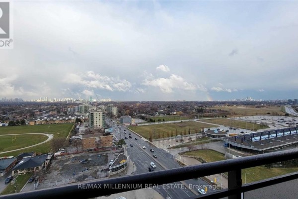 Panoramic view of Toronto cityscape from a high-rise apartment balcony with a cloudy sky and distant buildings. - Ph08 - 1060 Sheppard Avenue, Toronto